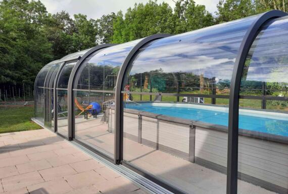 Réalisation d'un abri de piscine Gustave Rideau à Port-des-Barques pour Jean-Paul et Martine