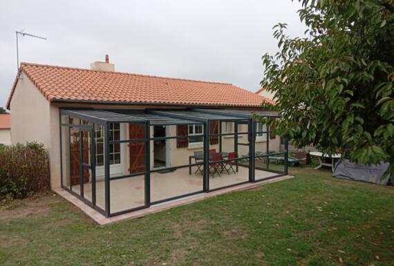 Réalisation d'un abri de terrasse Gustave Rideau à Le Puy-St-Bonnet pour Jean-Yves
