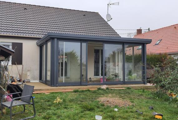 Réalisation d'une véranda Gustave Rideau à Aux Y pour Olivier et Elodie