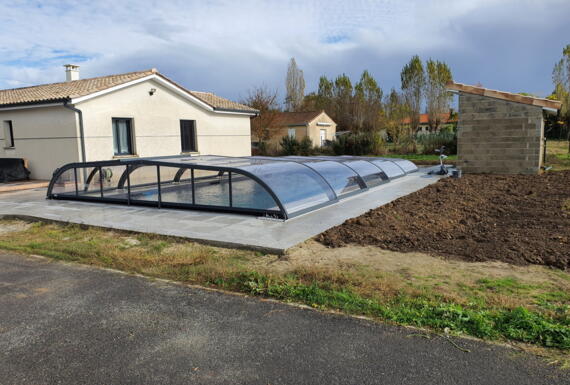 Réalisation d'un abri de piscine Gustave Rideau à Sainte-Eulalie pour Jonathan
