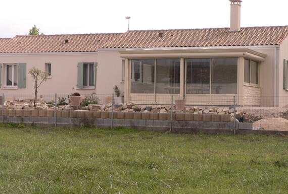 Réalisation d'une véranda Gustave Rideau à Matha pour Roland