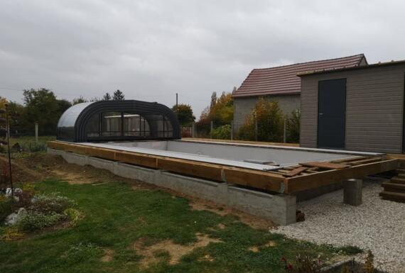Réalisation d'un abri de piscine Gustave Rideau à Flogny-La-Chapelle pour Jean-Baptiste