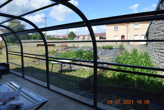Réalisation d'un abri de terrasse Gustave Rideau à Ravennefontaines pour Olivier