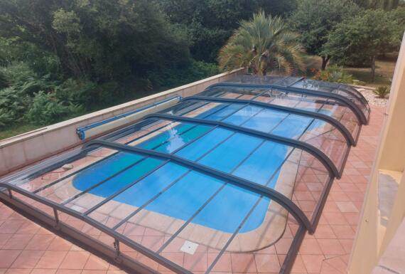 Réalisation d'un abri de piscine Gustave Rideau à Kervignac pour Yves