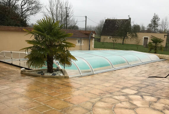 Réalisation d'un abri de piscine Gustave Rideau à Brette-Les-Pins pour Alain