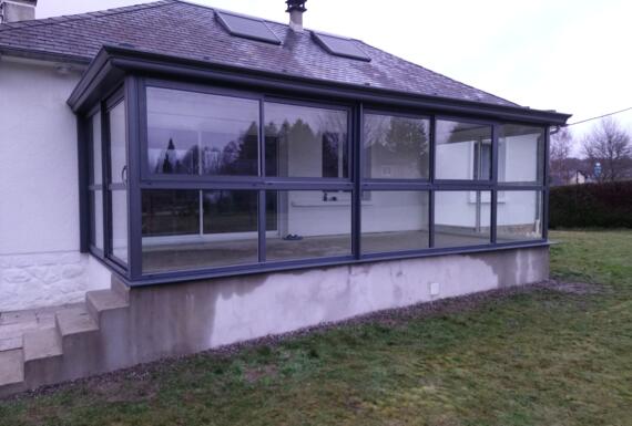 Réalisation d'une véranda Gustave Rideau à Rosiers-D’egletons pour Eliane et Jean-François