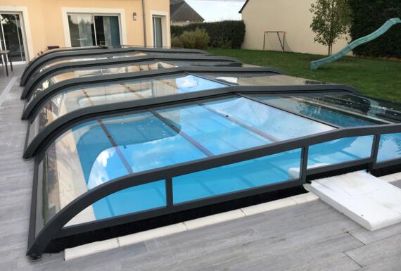 Réalisation d'un abri de piscine Gustave Rideau à Andard pour Jean-Pierre