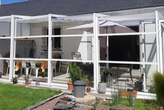 Réalisation d'un abri de terrasse Gustave Rideau à Nozay pour Monique