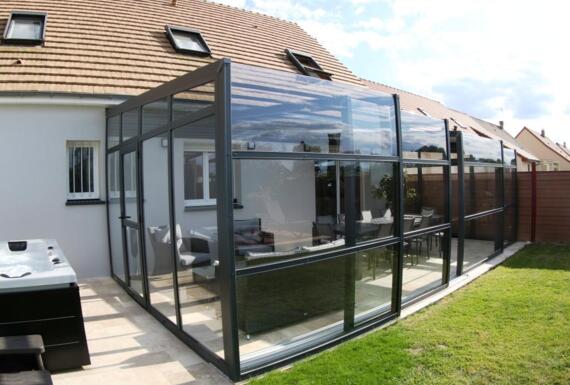 Réalisation d'un abri de terrasse Gustave Rideau à Beaumont-sur-Sarthe pour Sandrine & Bertrand