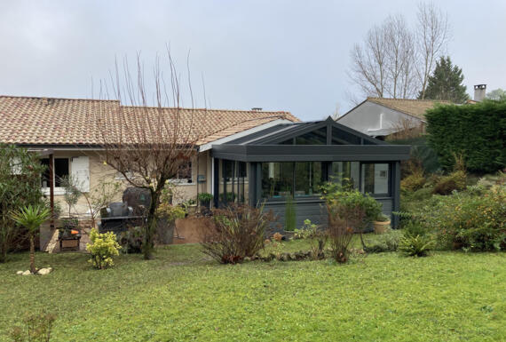 Réalisation d'une véranda Gustave Rideau à Sainte-Eulalie pour STEPHANO ET CHRISTINE
