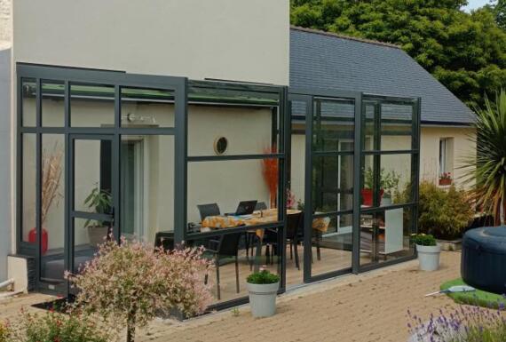 Réalisation d'un abri de terrasse Gustave Rideau à Ploudaniel pour Marc et Karine