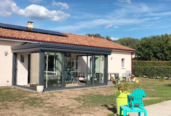 Réalisation d'une véranda Gustave Rideau à La Force pour Eric et Paulette