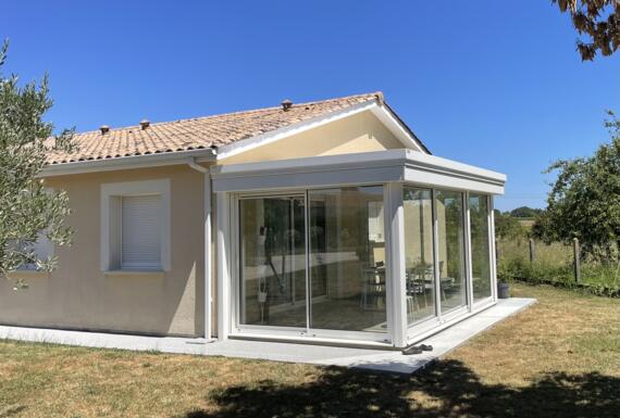 Réalisation d'une véranda Gustave Rideau à Sainte-Eulalie pour STEPHANE ET AYAKA