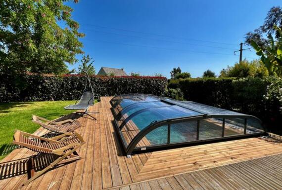 Réalisation d'un abri de piscine Gustave Rideau à La Chapelle-Chaussee pour Corinne & Eric