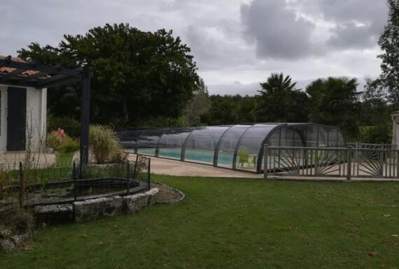 Réalisation d'un abri de piscine Gustave Rideau à Fontcouverte pour Dominique