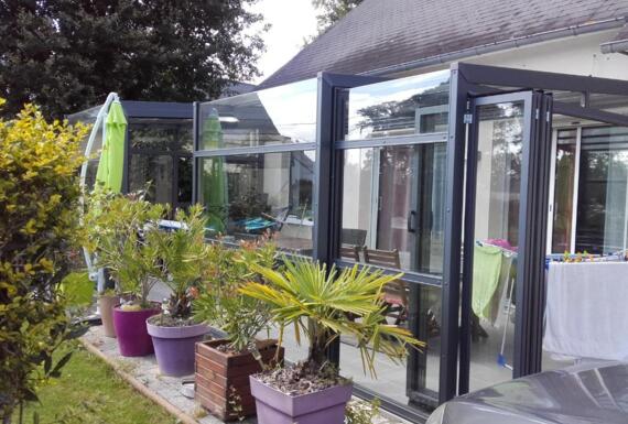 Réalisation d'un abri de terrasse Gustave Rideau à Grandchamps-des-Fontaines pour Dominique