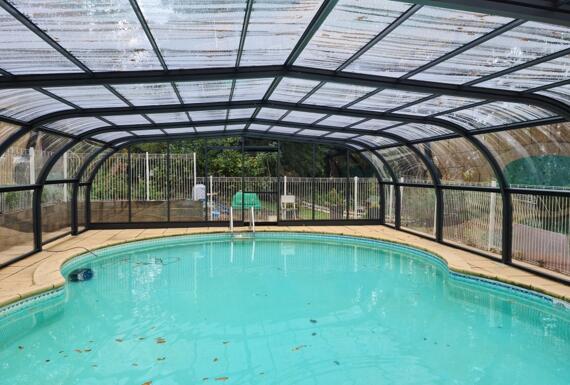 Réalisation d'un abri de piscine Gustave Rideau à Saint-Louis-En-L’isle pour Brian et Jacqueline