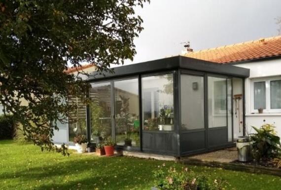 Réalisation d'une véranda Gustave Rideau à Divatte-sur-Loire pour Marie-Jo et Claude