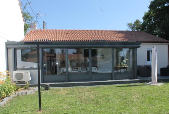 Réalisation d'une véranda Gustave Rideau à Sainte-Pazanne pour Philippe et Jeannine