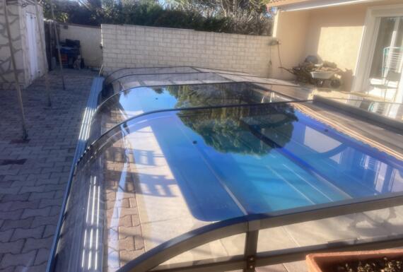 Réalisation d'un abri de piscine Gustave Rideau à Colombiers pour Arlette